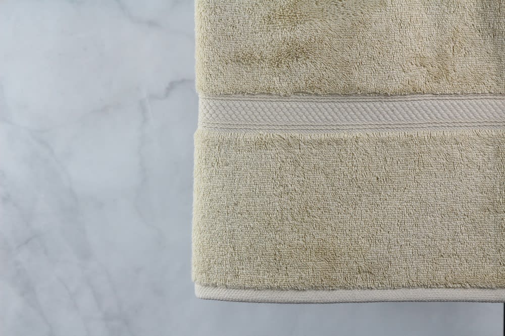 GuestSupply US | Magnificence® Bath Towel, Blended Dobby Border